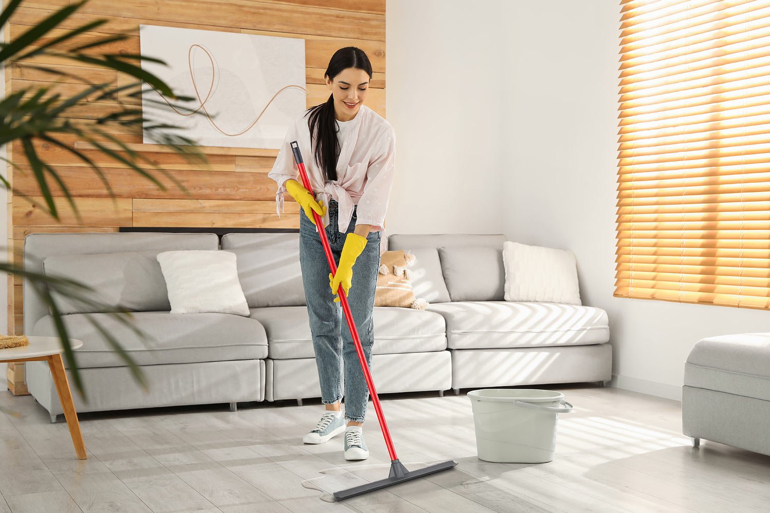 Ecommerce lifestyle photo with stock image of female model and cleaning product